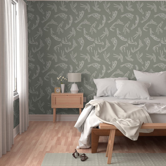 Sage Ridge sage green antler wallpaper styled in a bedroom interior — Pine + Feather Studio