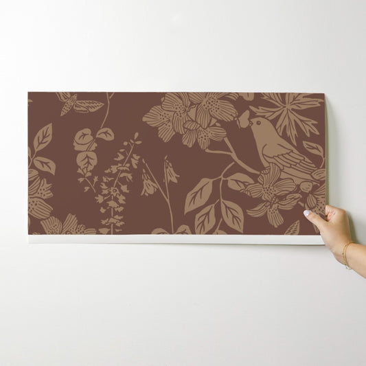 Western Birds and Flowers wallpaper swatch in Saddle — leather brown wallpaper by Pine + Feather Studio