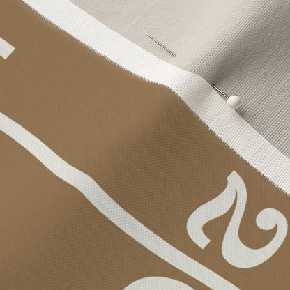 gold linen lumbar pillow cover fabric detail showing football field yard lines and numbers — linen canvas pillow texture close-up