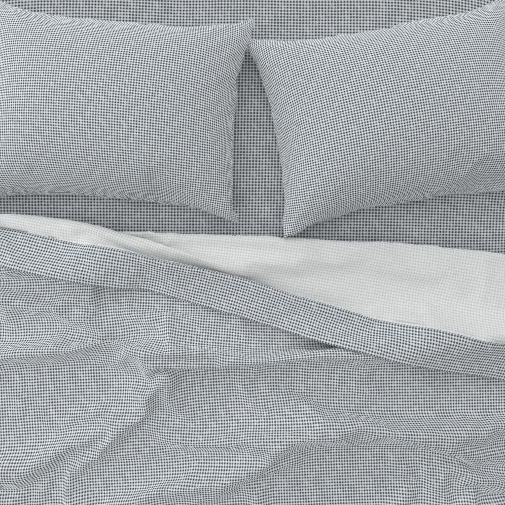 cotton sateen sheets in navy gingham showing subtle sateen sheen — Gridiron Gingham sheet set fabric detail