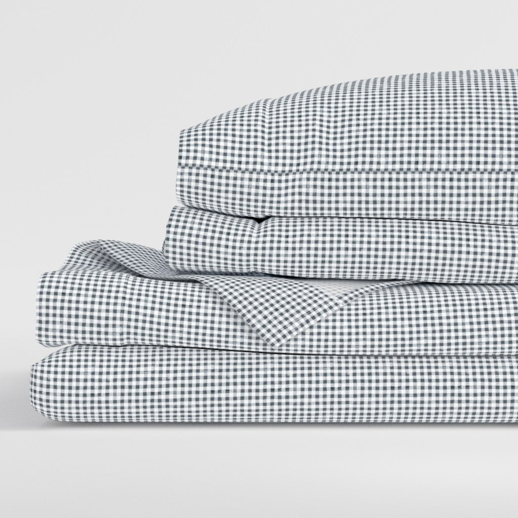 Gridiron Gingham navy gingham sheet set folded showing complete set including flat sheet fitted sheet and pillowcases