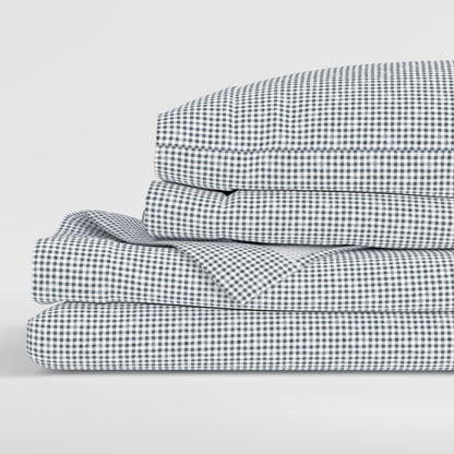 Gridiron Gingham navy gingham sheet set folded showing complete set including flat sheet fitted sheet and pillowcases