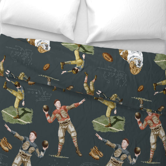 vintage football bedding close-up showing hand-illustrated 1920s players and English bulldog mascot on dark slate