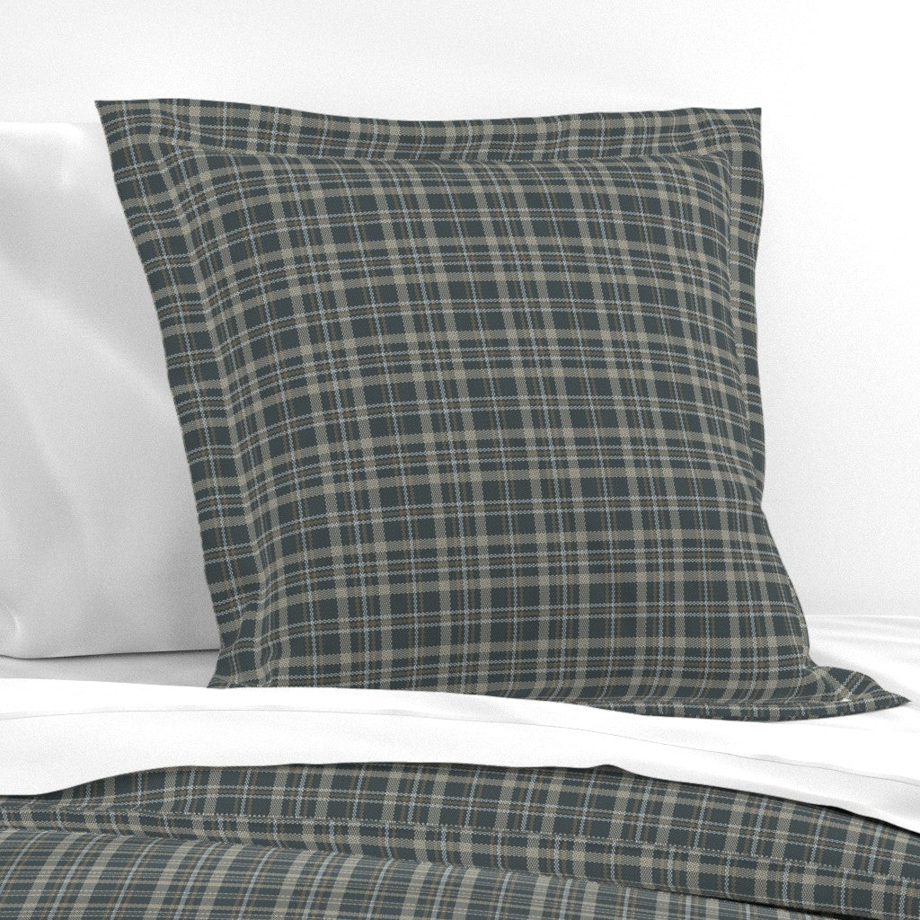 Touchdown Tartan cotton pillow sham styled on a bed — dark plaid pillow sham in flanged euro size with dark slate tartan
