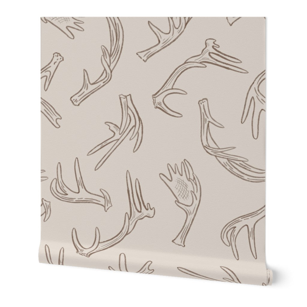 Antler Dance wallpaper roll in Bone Canyon — warm neutral antler wallpaper by Pine + Feather Studio