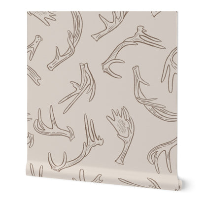Antler Dance wallpaper roll in Bone Canyon — warm neutral antler wallpaper by Pine + Feather Studio