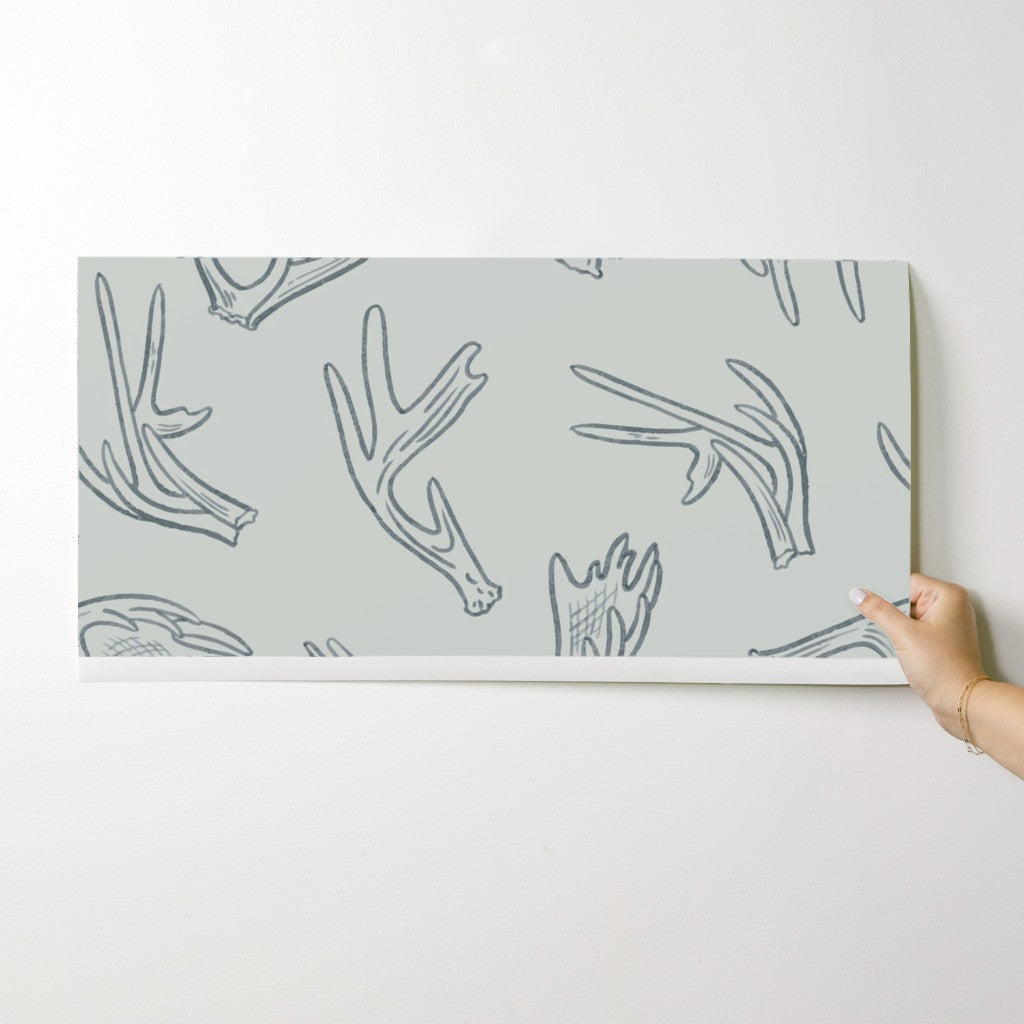 Antler Dance wallpaper swatch in Morning Frost — tonal antler wallpaper by Pine + Feather Studio