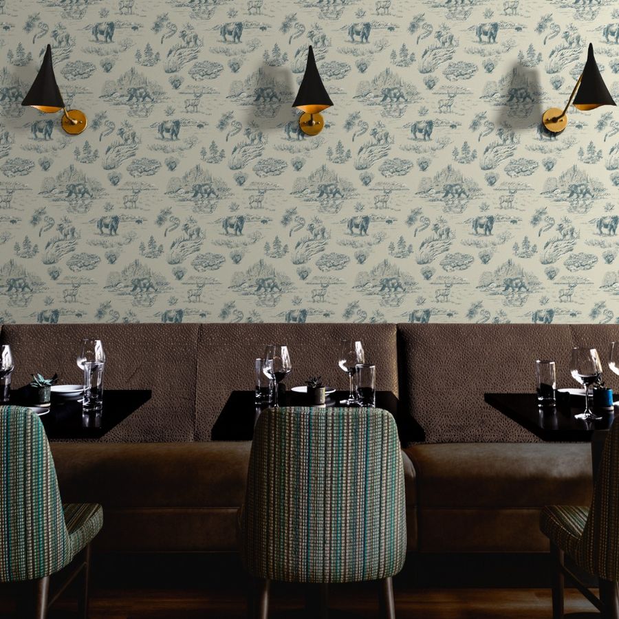 Clear River Yellowstone wallpaper styled in a restaurant hospitality room interior — Pine + Feather Studio