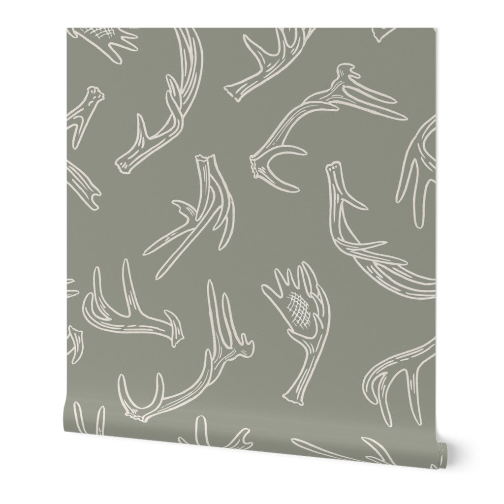 Antler Dance wallpaper roll in Sage Ridge — sage green antler wallpaper by Pine + Feather Studio