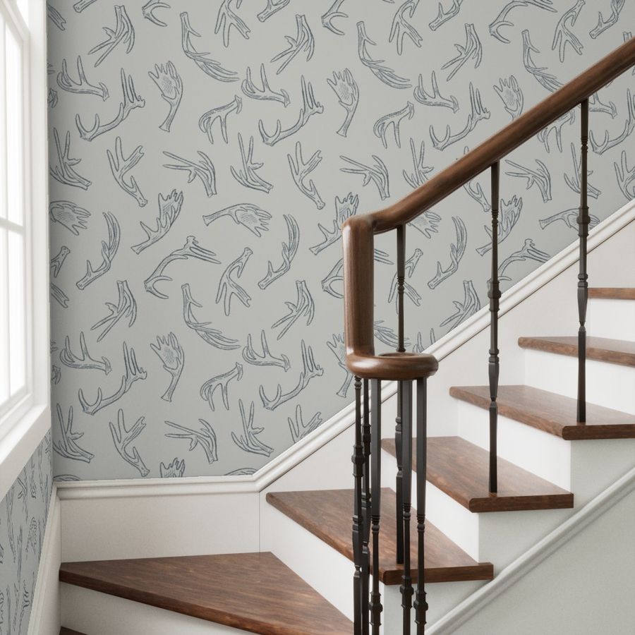 Morning Frost antler wallpaper styled in a stairway hallway transitional interior — Pine + Feather Studio