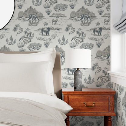 Silver Creek Yellowstone wallpaper styled close up view in a bedroom interior — Pine + Feather Studio