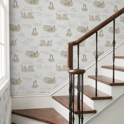 Peel and stick football wallpaper in sepia on a staircase wall — vintage sports wallpaper for hallways and entryways