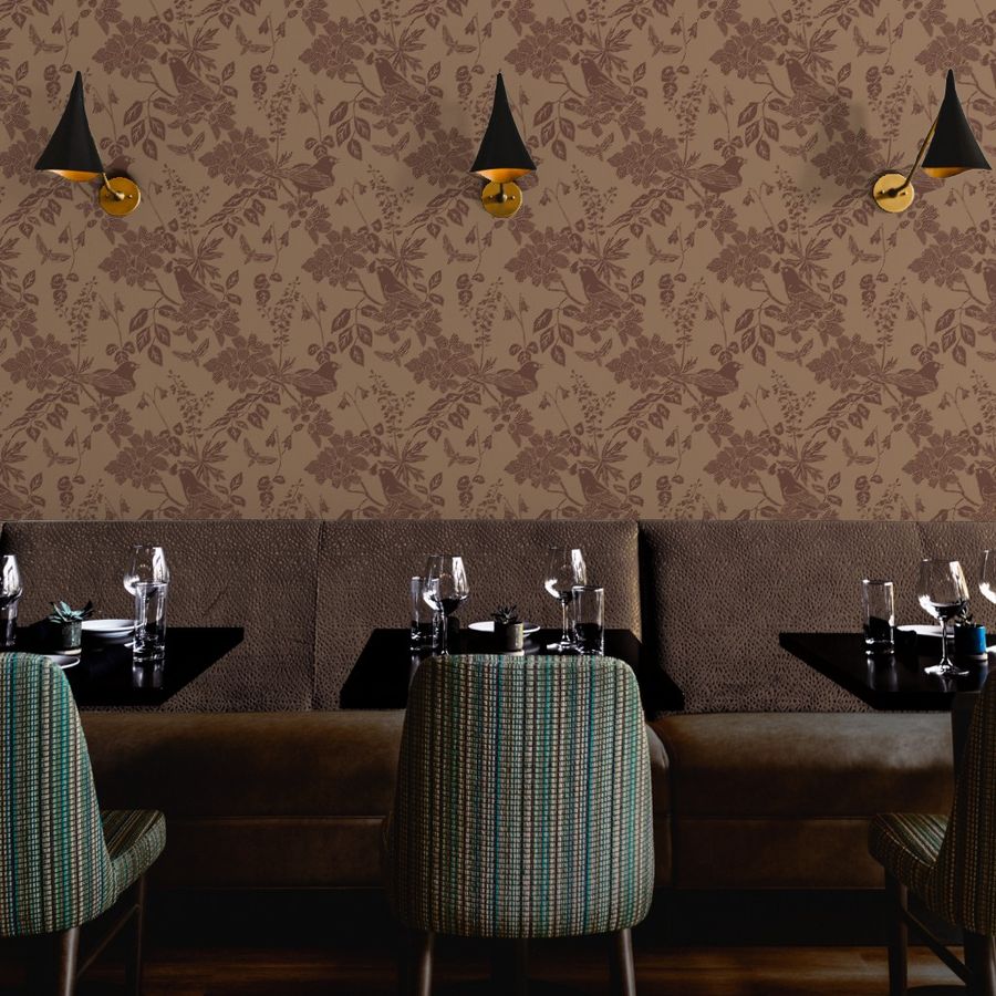 Western Birds and Flowers wallpaper in Buckskin styled in a restaurant hospitality interior — saddle brown wallpaper by Pine + Feather Studio