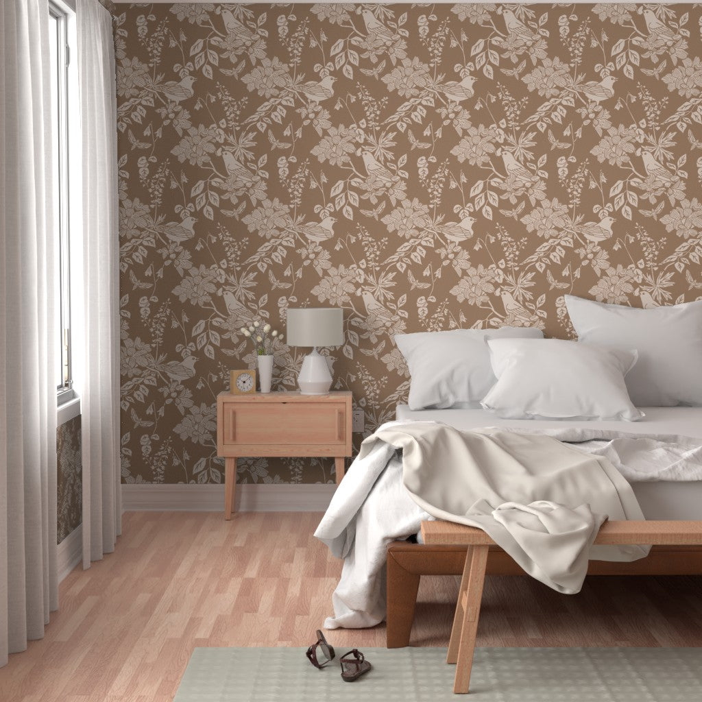 Western Birds and Flowers wallpaper in Harvest Rose styled in a bedroom interior — warm cream wallpaper by Pine + Feather Studio