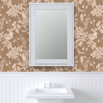 Western Birds and Flowers wallpaper in Harvest Rose styled in a powder room interior — warm cream wallpaper by Pine + Feather Studio