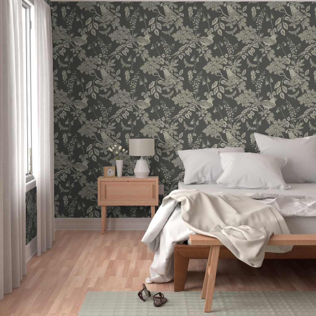 Western Birds and Flowers wallpaper in Old Growth styled in a bedroom interior — moody green wallpaper by Pine + Feather Studio