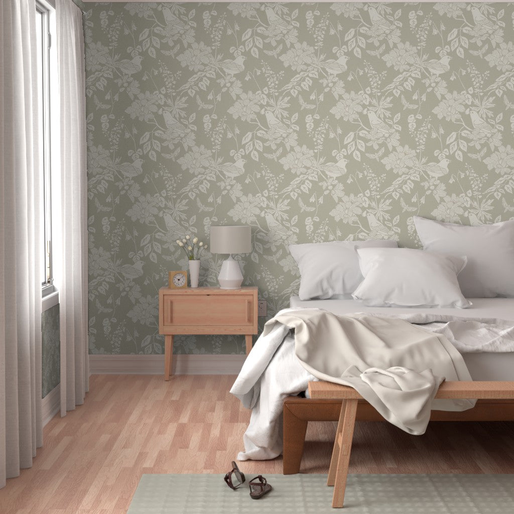 Western Birds and Flowers wallpaper in Pale Rain styled in a bedroom interior — creamy white wallpaper by Pine + Feather Studio