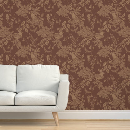 Western Birds and Flowers wallpaper in Saddle styled in a living room interior — leather brown wallpaper by Pine + Feather Studio