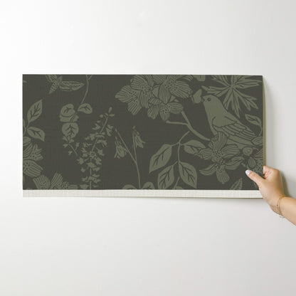 Western Birds and Flowers wallpaper swatch in Pine Shadow — earthy green wallpaper by Pine + Feather Studio
