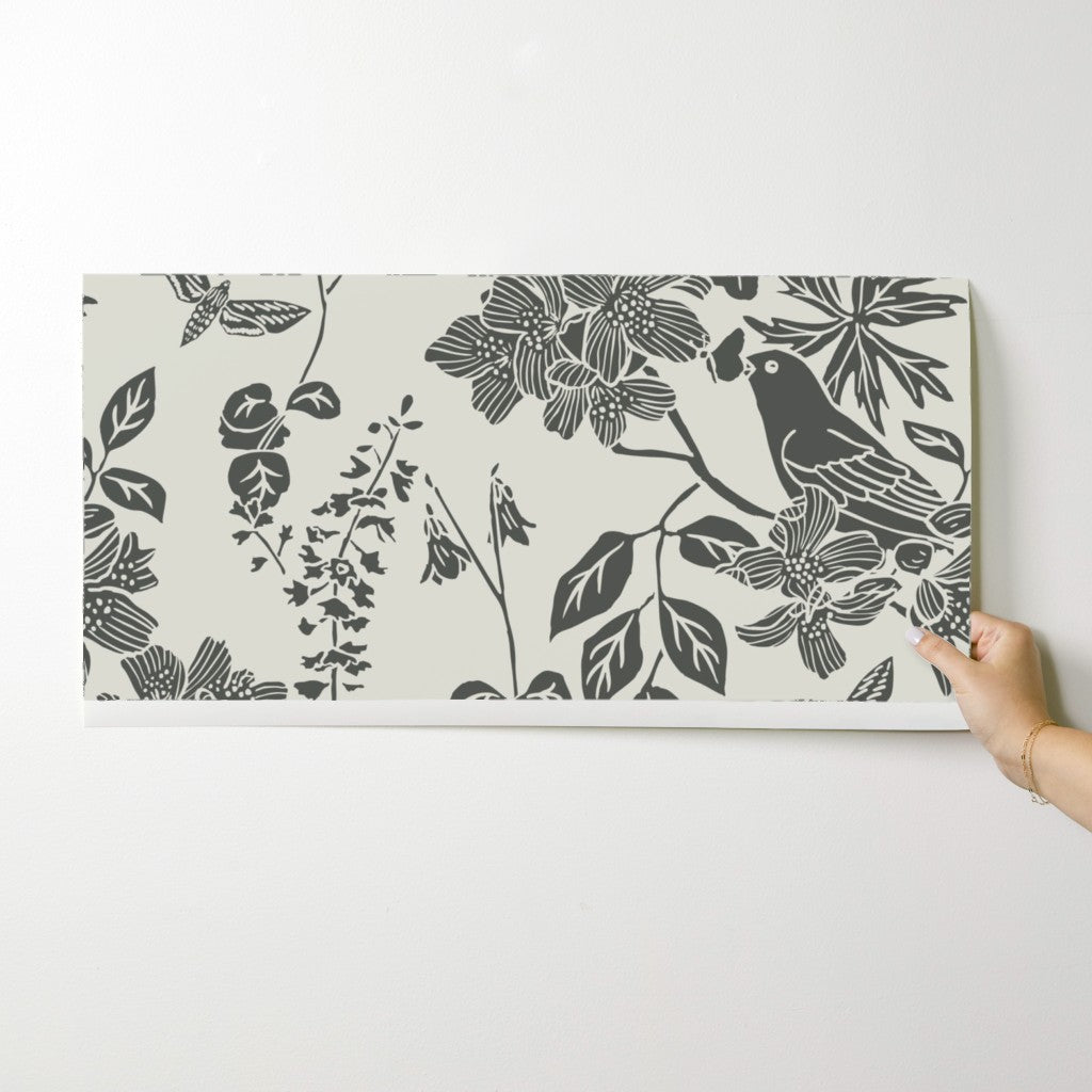 Western Birds and Flowers wallpaper swatch in Winter Moss — parchment wallpaper by Pine + Feather Studio