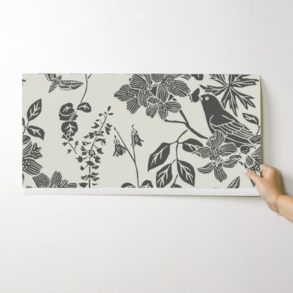 Western Birds and Flowers wallpaper swatch in Winter Moss — parchment wallpaper by Pine + Feather Studio