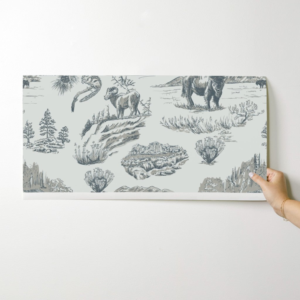 Wild Yellowstone Toile wallpaper swatch in Silver Creek — tonal yellowstone wallpaper by Pine + Feather Studio