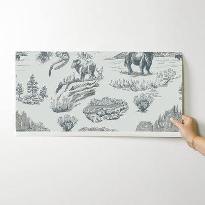Wild Yellowstone Toile wallpaper swatch in Silver Creek — tonal yellowstone wallpaper by Pine + Feather Studio