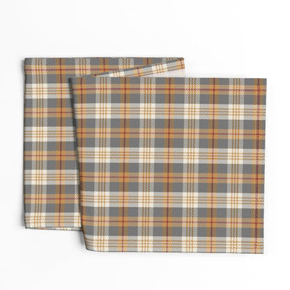 Folded Winter Hearth plaid table runner showing the hem and unprinted back