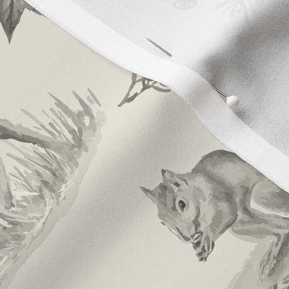 Close-up of the Woodland Toile fabric in Charcoal on cotton sateen, showing a hand-drawn squirrel and the fabric's smooth weave